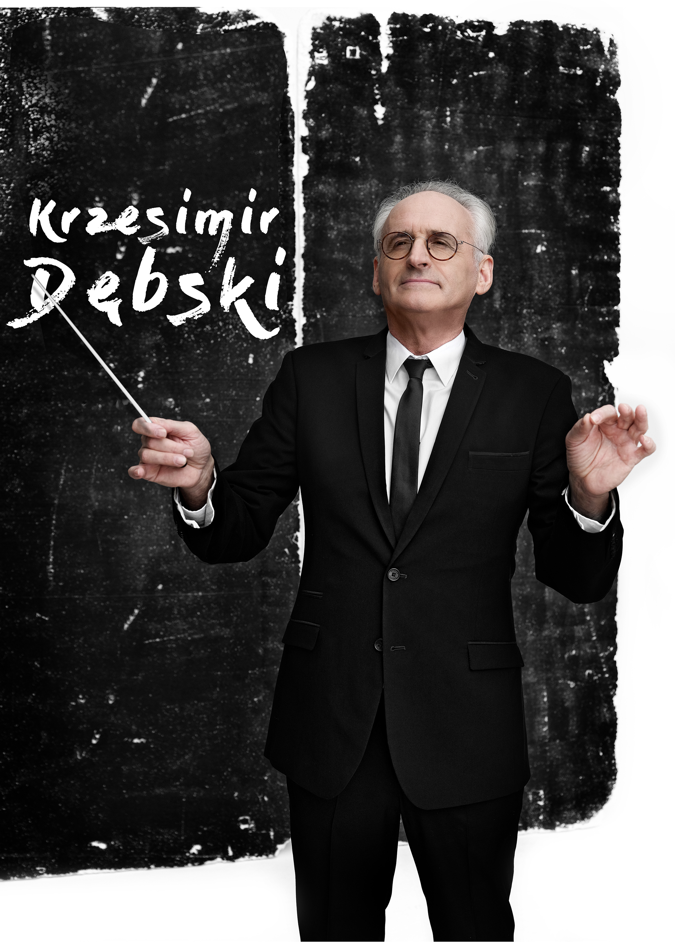 zdjęcie przedstawiające Krzesimira Dębskiego z batutą