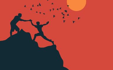 osoby wspinające się w otoczeniu zachodu słońca