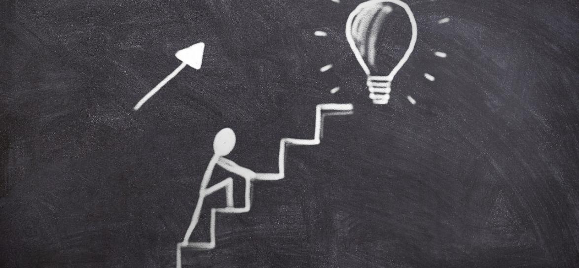 Rynek przedstawiający osobę pnącą się po schodach