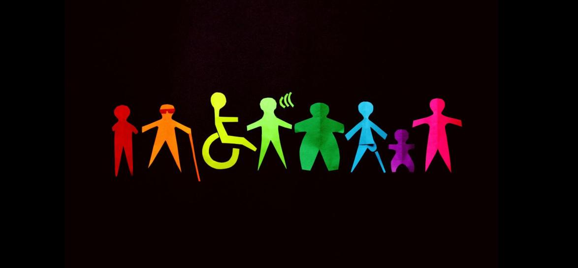 element dekoracyjny przedstawiający ludziki, w tym osobę - zarys na wózku inwalidzkim