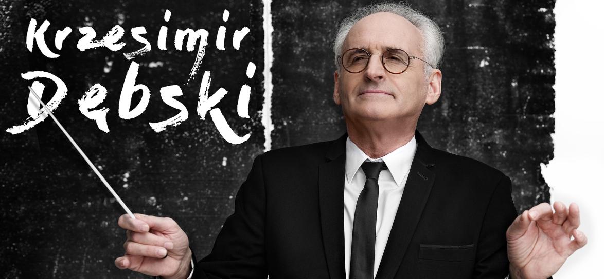 zdjęcie przedstawiające Krzesimira Dębskiego z batutą